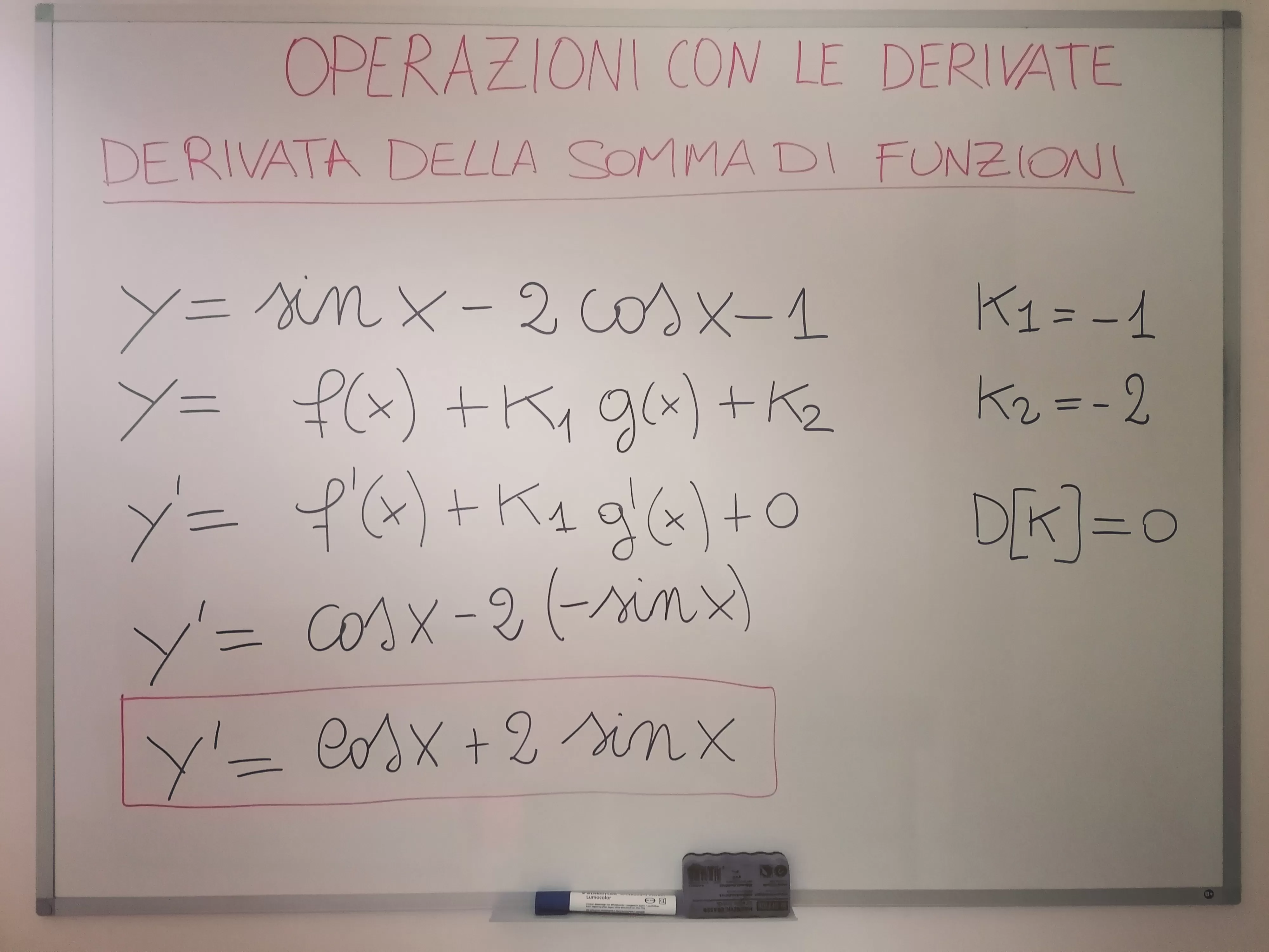 Calcola la derivata di y=sin(x) - 2 cos(x)-1